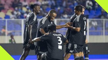 Video: Taye Taiwo goes on one knee, shines Okocha’s boots after stunner in novelty match