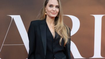Angelina Jolie Puts a Festive Twist on the Holiday Suit