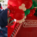 Travis $cott Holds 5th Annual Winter Wonderland Holiday Giveback At TSU