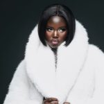 Striking Poses While Cradling Cuteness: Adut Akech Bior’s Birthday Look is #NewMomGoals