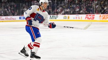 Joshua Roy hits the boards hard and has to leave the Rocket game.