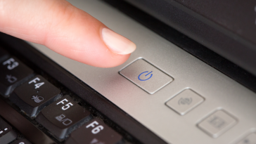 What does the symbol on a power button mean? How did it come about?