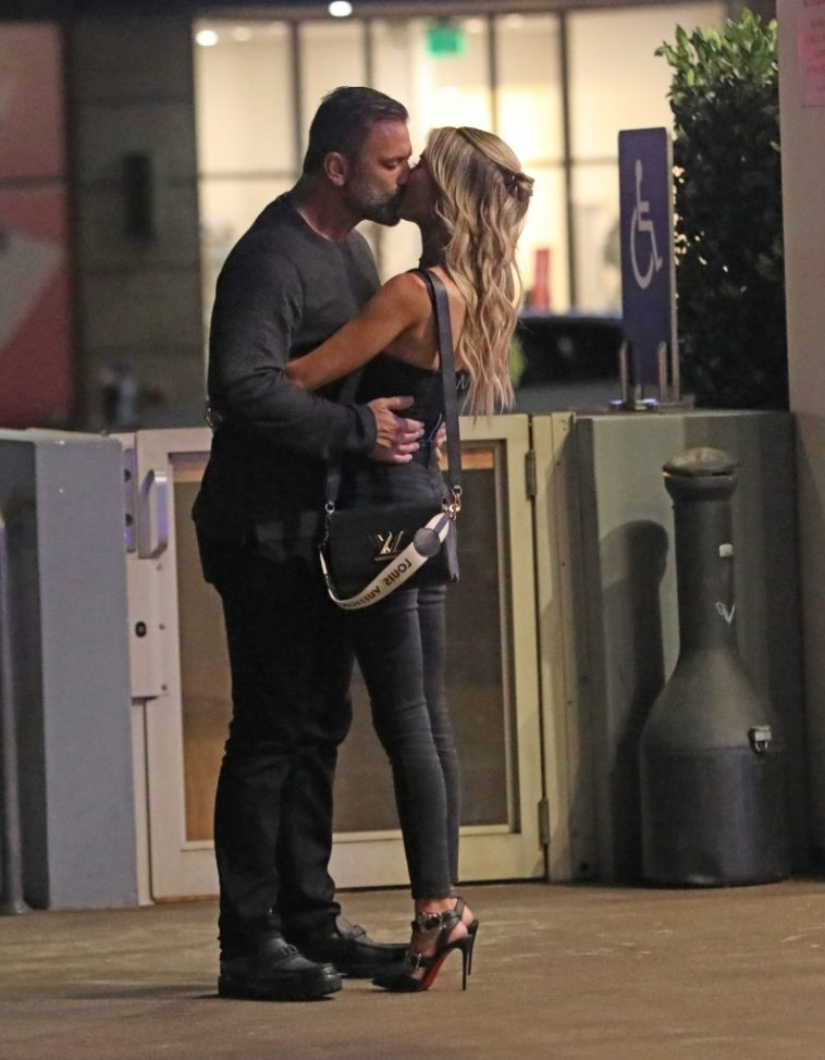 Christina Hall makes out in public with new boyfriend Christopher Larocca as divorce battle with Josh continues