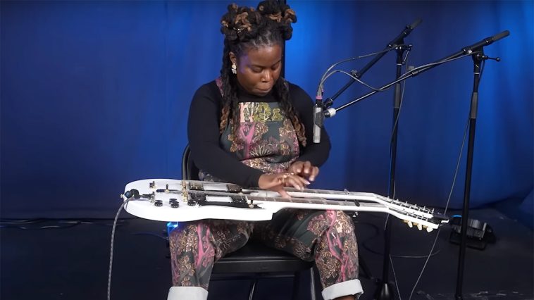 “People say, ‘You’re playing the guitar on your lap, you learned from Guitar Hero.’ But it’s taken years to figure out how to write complex compositions”: Yasmin Williams brings lap-tapping and double-neck guitar to late-night TV with Colbert
