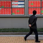 Stocks skid, bonds rally as tariffs stoke recession risk