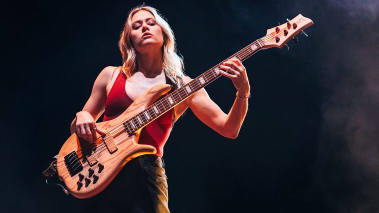 “These guys started the band the same year I was born – they have a whole world of history together”: How Nicole Row went from a wild ride in Panic! at the Disco to laying down the low-end in Incubus – and rerecording their biggest album