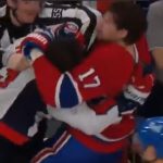 Josh Anderson and Tom Wilson battle it out on the Caps bench