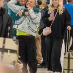 JoJo Siwa and Chris Hughes have affectionate reunion in London after confirming romance with a kiss