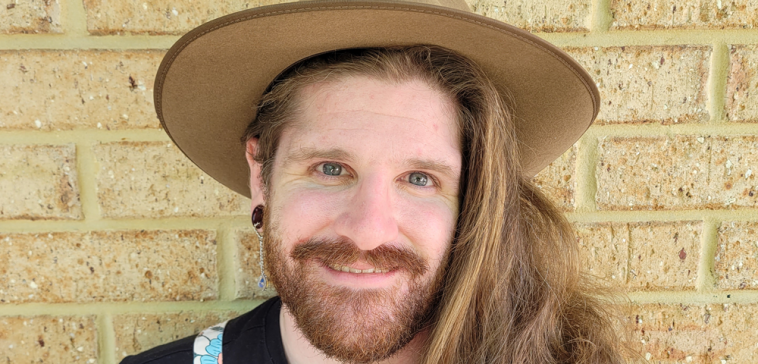 Queer Author Chuckie Raven Wins Prestigious Literary Prize for Debut Novel