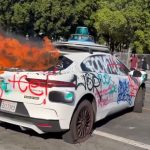 Defenseless Waymo cars have been vandalised and set on fire in the LA protests