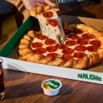 Papa John’s Introduces Its Debut Croissant Pizza, Offering Pizza Enthusiasts an Unprecedented Flaky Experience