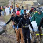 South Africa floods: Rescuers still pulling bodies out of water as death toll in reaches 86