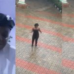 Man shares the surprising moment he saw his neighbour dancing under the rain (WATCH)