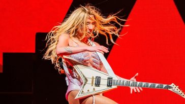 Metal guitars have officially gone mainstream – as pop star Kesha is the latest to don a Jackson Rhoads model