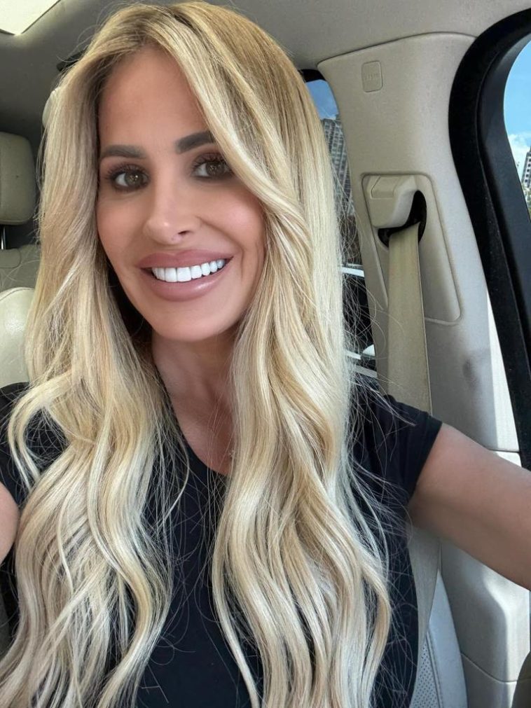 Kim Zolciak flaunts her body in a tiny bikini after revealing every plastic surgery procedure she’s had done
