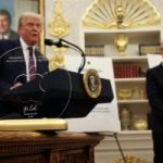 Apple CEO Tim Cook’s $100 billion commitment to U.S. manufacturing came with a gift for Trump: a glass ‘Made in USA’ plaque mounted on 24-karat gold