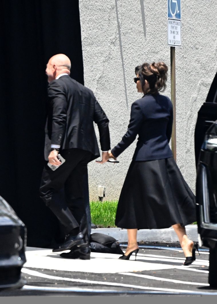 Jeff Bezos gets support from Lauren Sanchez as they arrive hand-in-hand at his mom’s funeral