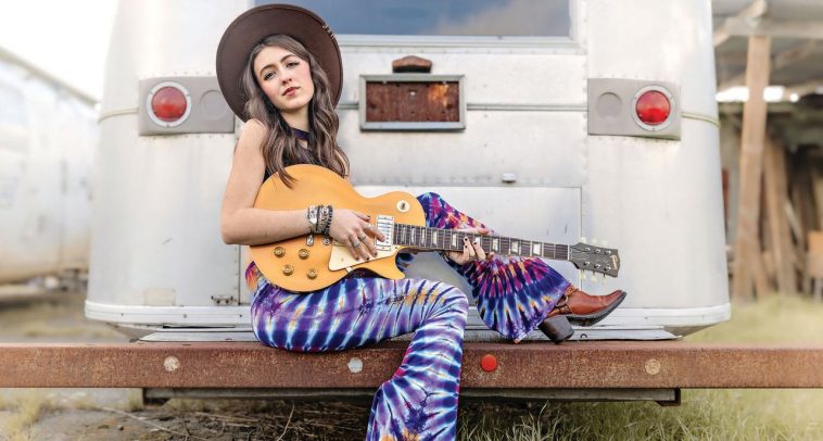 “I said, ‘I can’t accept this. I haven’t earned it.’ He was like, ‘You need to go pick it up’”: How a 17-year-old guitar prodigy ended up with a 1957 Goldtop Reissue from the foundation of a band she once hated – after her Number One Les