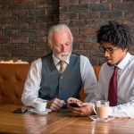 ‘Unifier Across Generations’: Gen Z Is Helping Older Colleagues Learn How to Use AI at Work, According to a New Survey