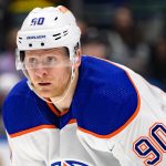 Corey Perry leaves the rink in a wheelchair