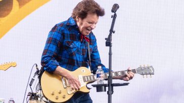 “It always takes a certain amount of time to work up to where you were yesterday”: As he revisits his most beloved Creedence Clearwater Revival hits to some of the biggest crowds of his career, John Fogerty’s guitar practice regimen is as rigorous as
