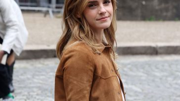Emma Watson Riding Motorcycle at Paris Fashion Week