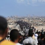 Tens of thousands of Palestinians return to devastated northern Gaza amid ceasefire