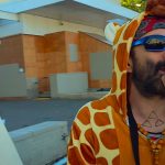Comedian Arrested in Giraffe Suit Says ICE Laughed at His Trump-Epstein Jokes