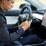 The regulatory reality check to Tesla allowing people to text and drive in a “a month or two”
