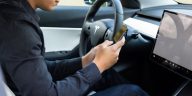 The regulatory reality check to Tesla allowing people to text and drive in a “a month or two”