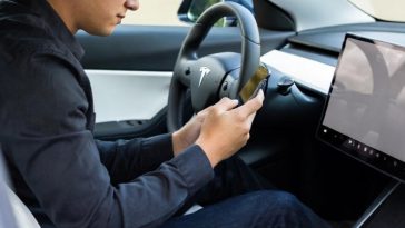 The regulatory reality check to Tesla allowing people to text and drive in a “a month or two”