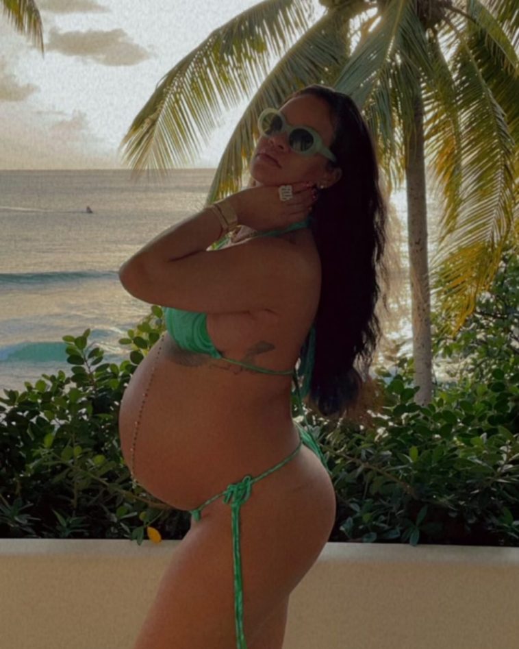 Rihanna drapes her baby bump in jewelry in never-before-seen pregnancy photo